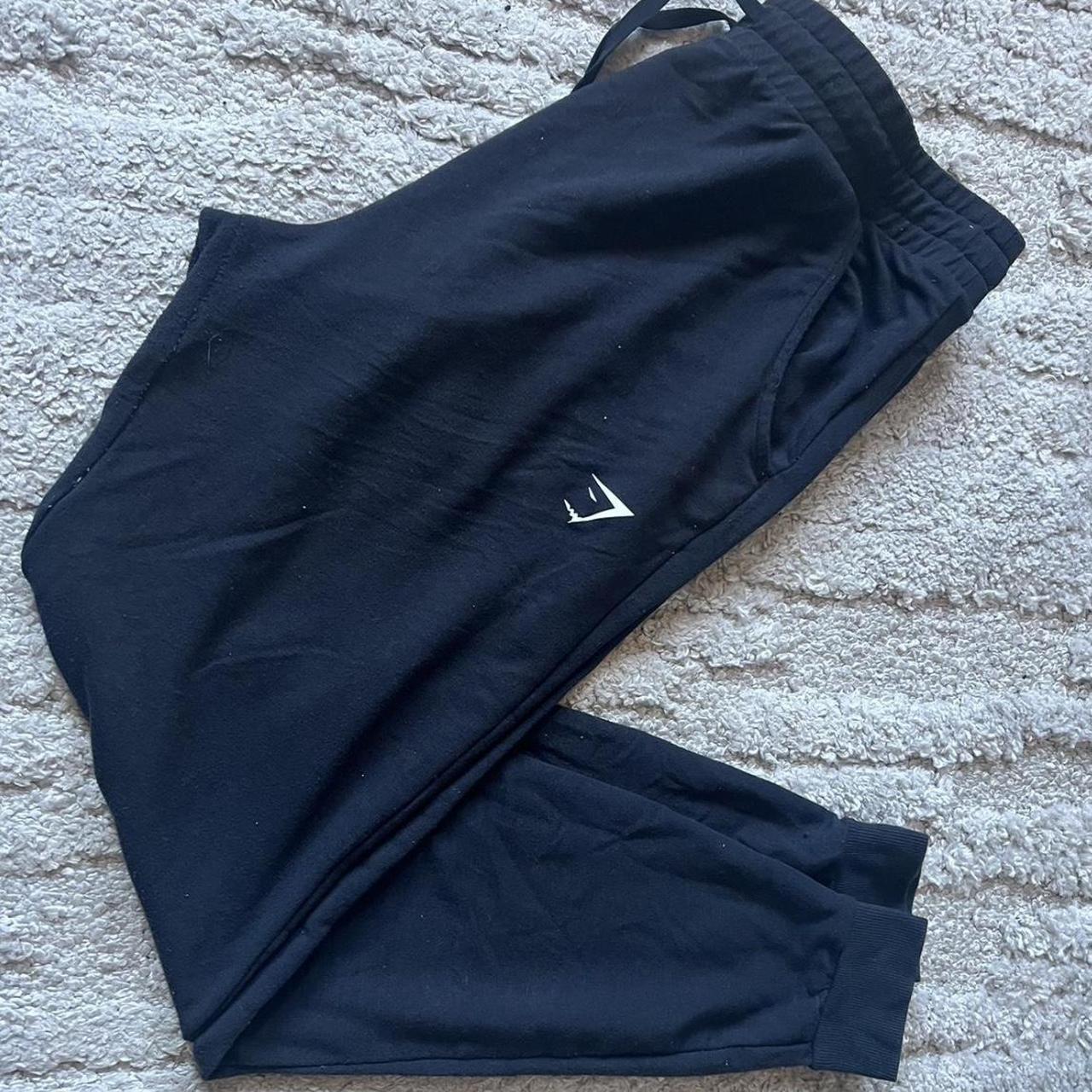 black gymshark sweatpants size xl but fits like... Depop