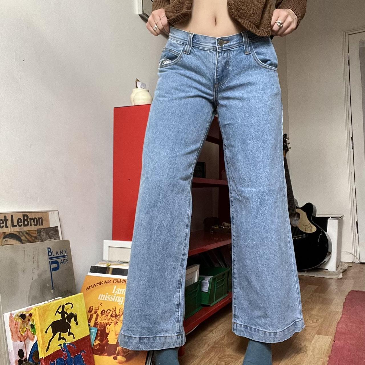 Brandy Melville low rise jeans with slight boot cut... - Depop