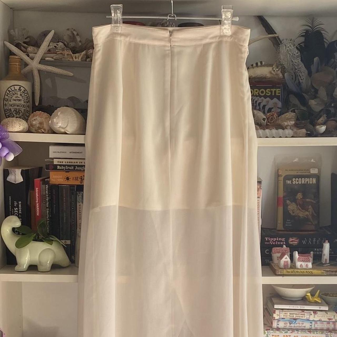 Sheer maxi skirt. Cream colour with a built in mini... - Depop