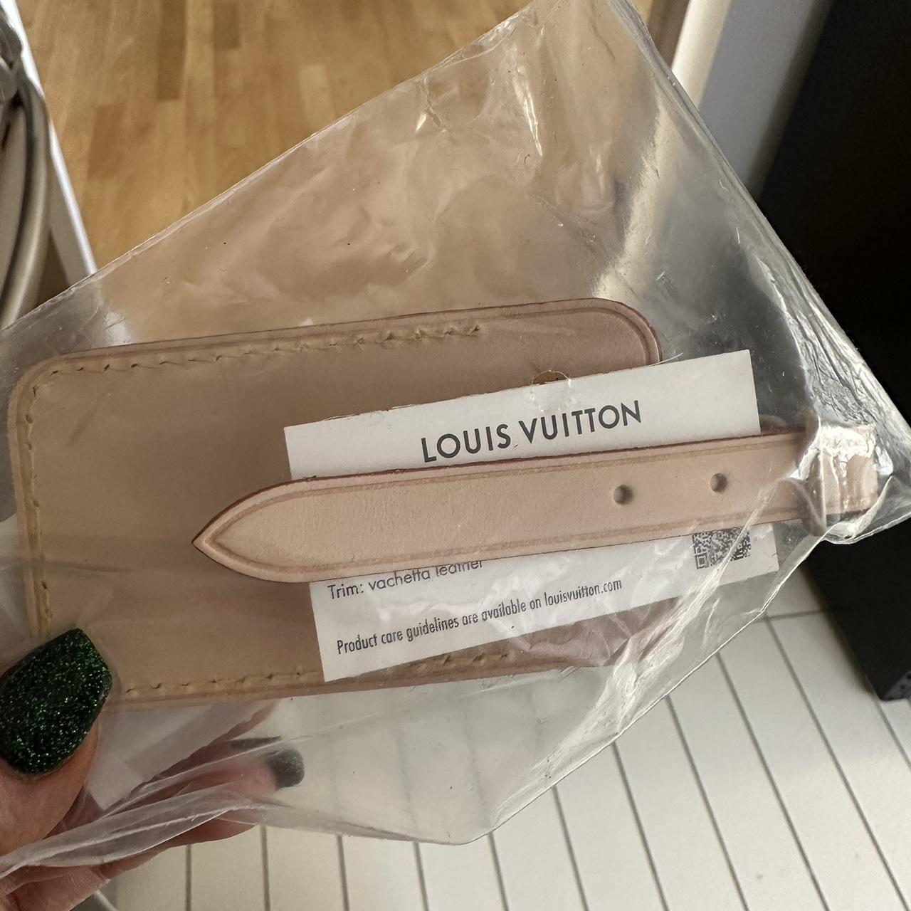 This an authentic Louis Vuitton Name Tag & Belt - Depop