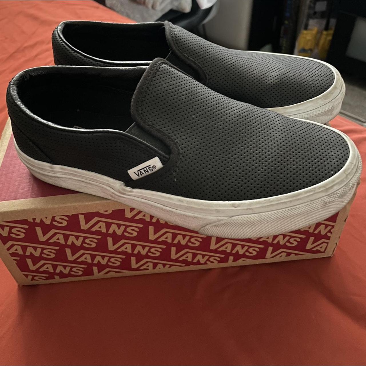 Vans classic slip on hot sale shoes black perforated leather