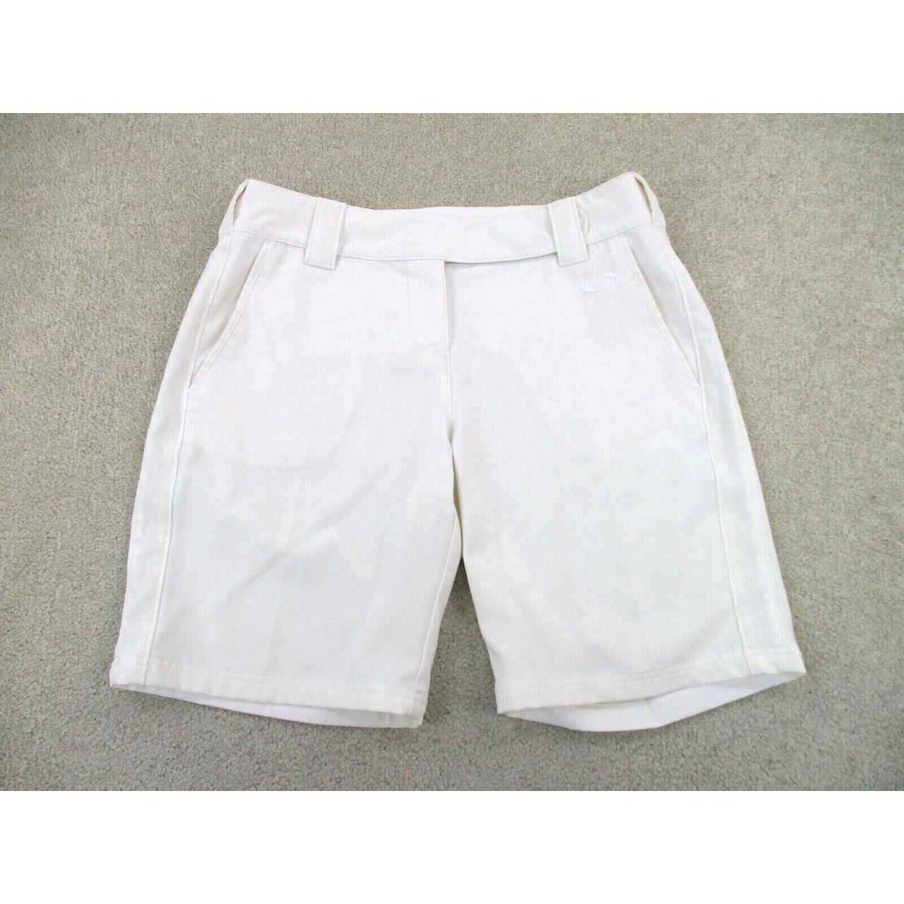 Oakley Women's White and Khaki Shorts | Depop