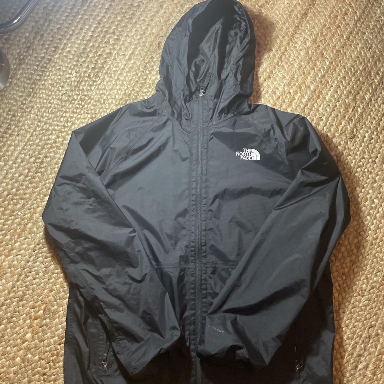 Black North Face light jacket with cinches on the... - Depop