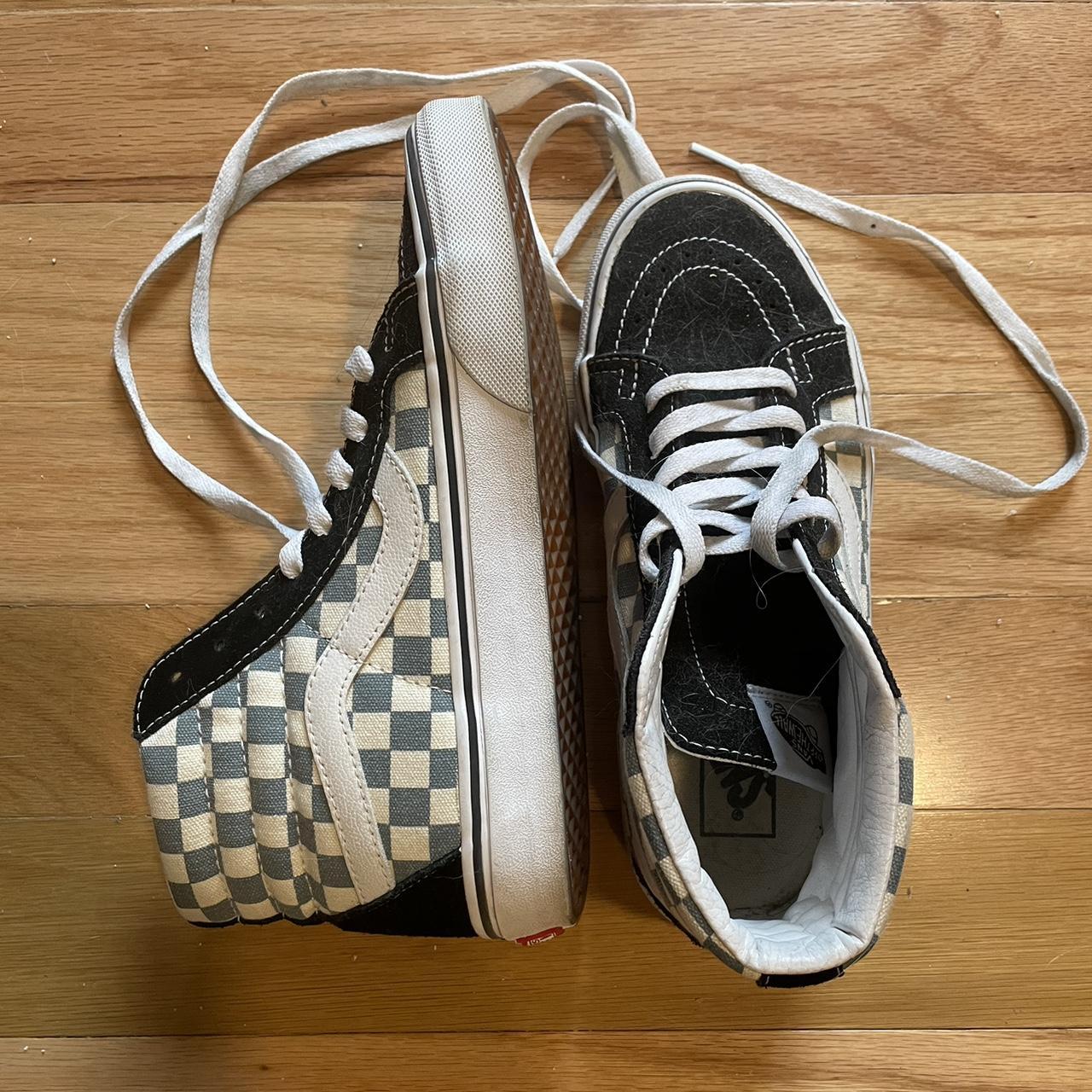 Light blue and 2024 black checkerboard vans