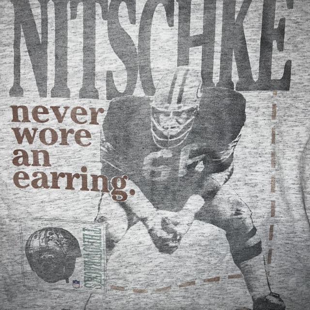 Ray Nitschke never wore an earring! This a bad man - Depop