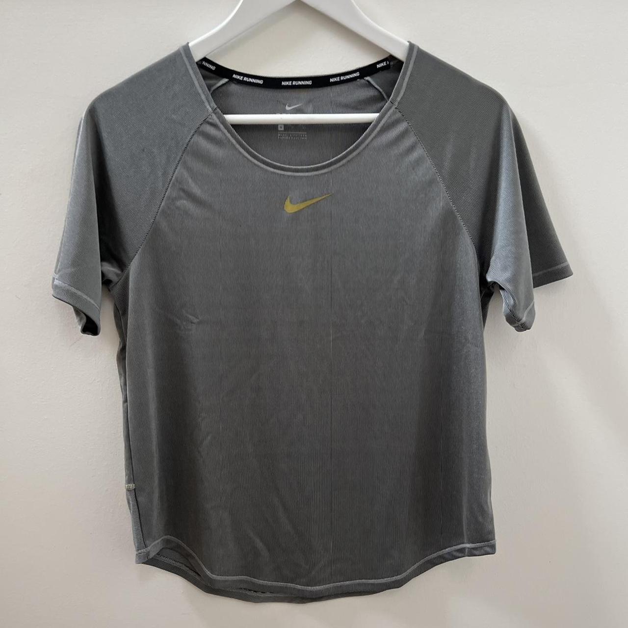 metallic silver nike shirts