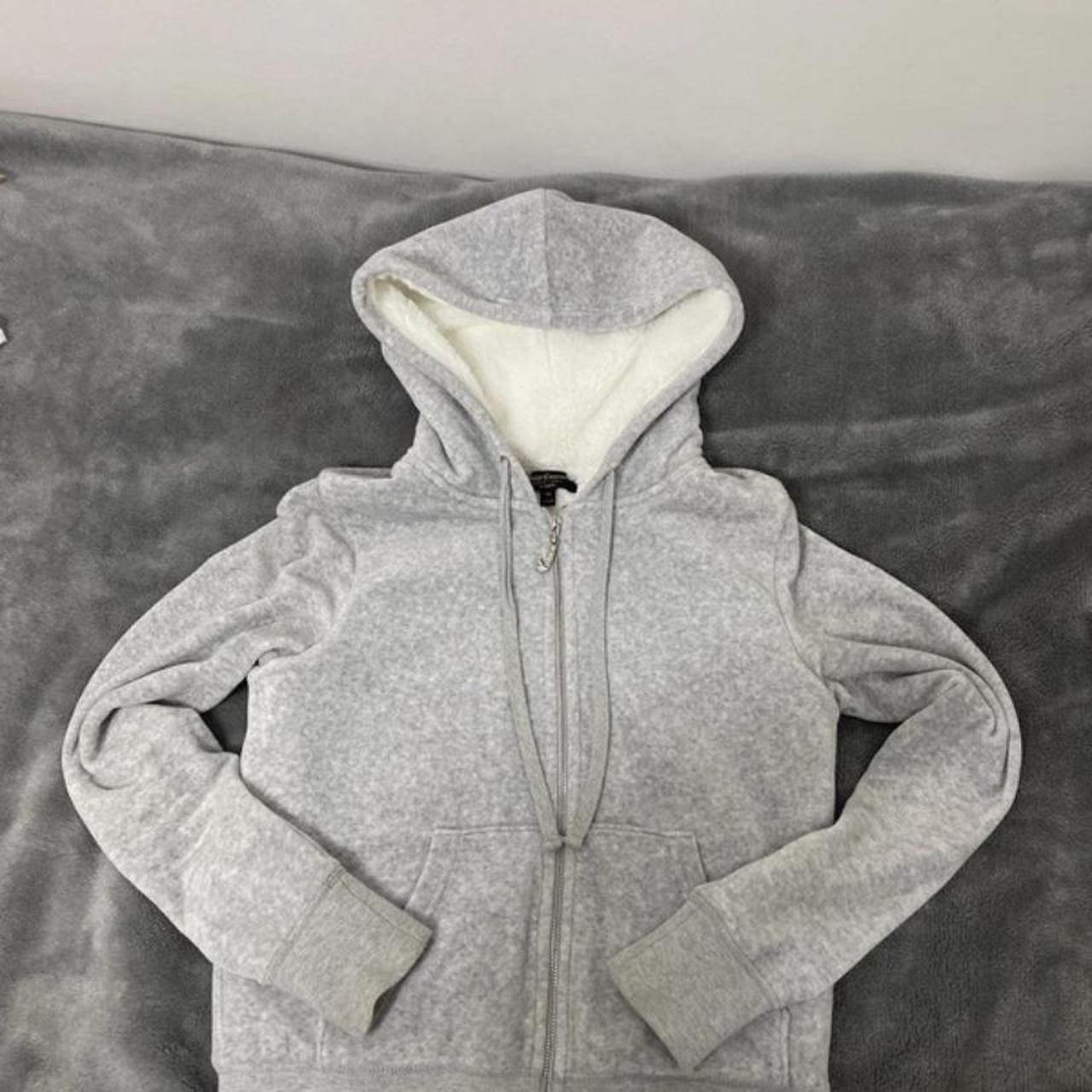 Grey juicy couture with white fur inside and inside. Depop