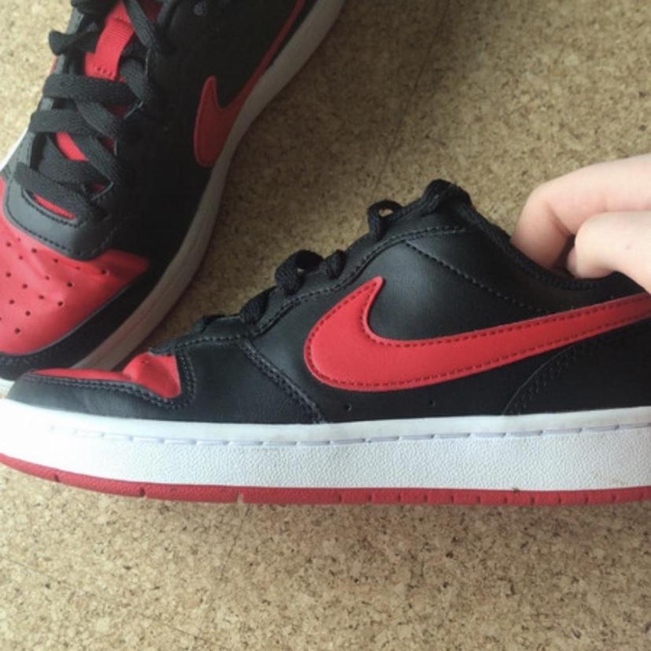 size 3 black nike trainers