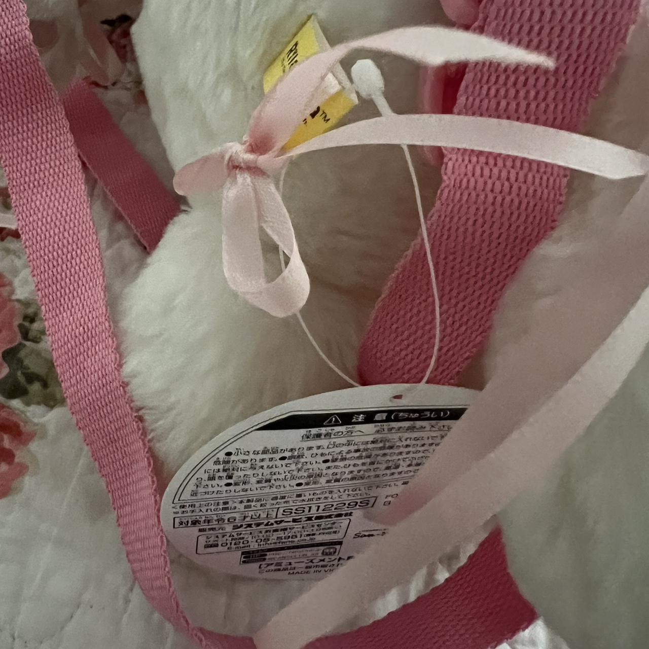 white kitty korilakkuma backpack, big, ribbons tied... - Depop