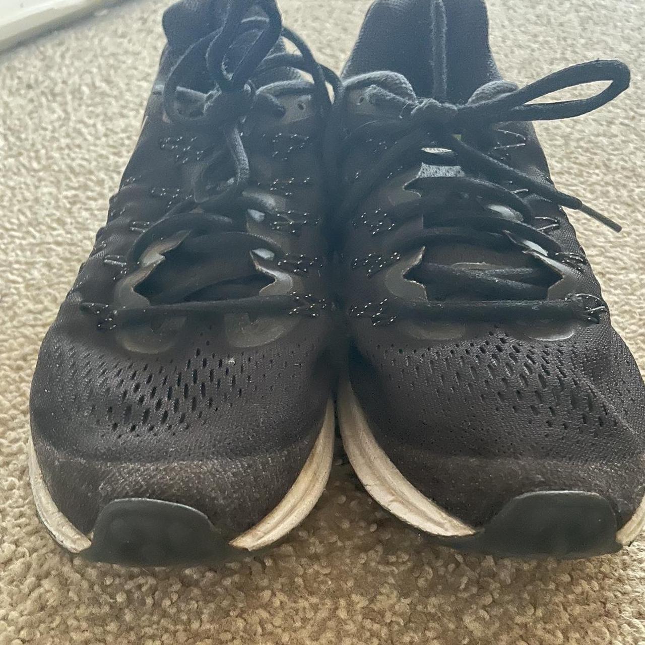 buy black nike trainers