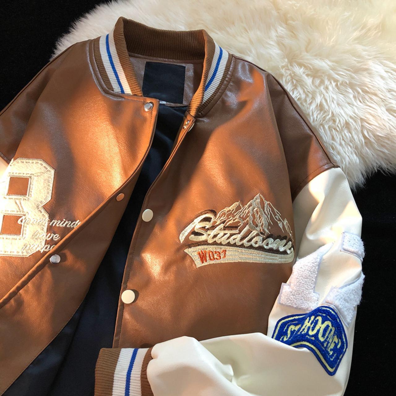 Brown Varsity Jacket With Embroidered Graphics Depop