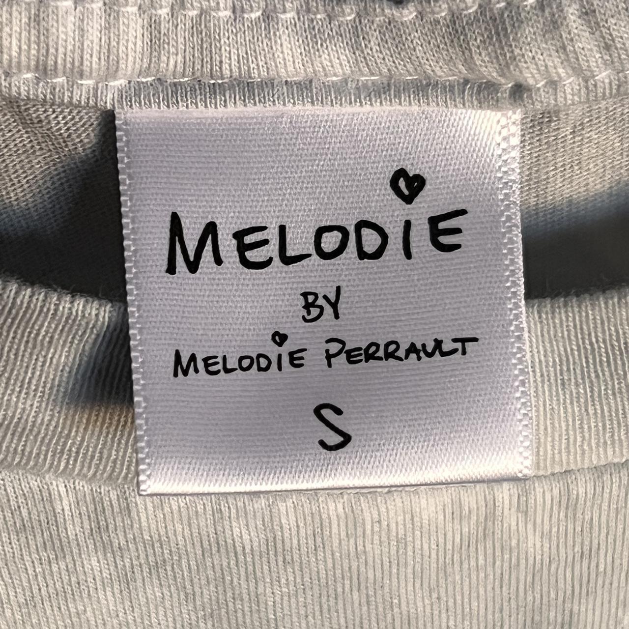 Melodie Perrault, gently used tshirt. Comfy and - Depop
