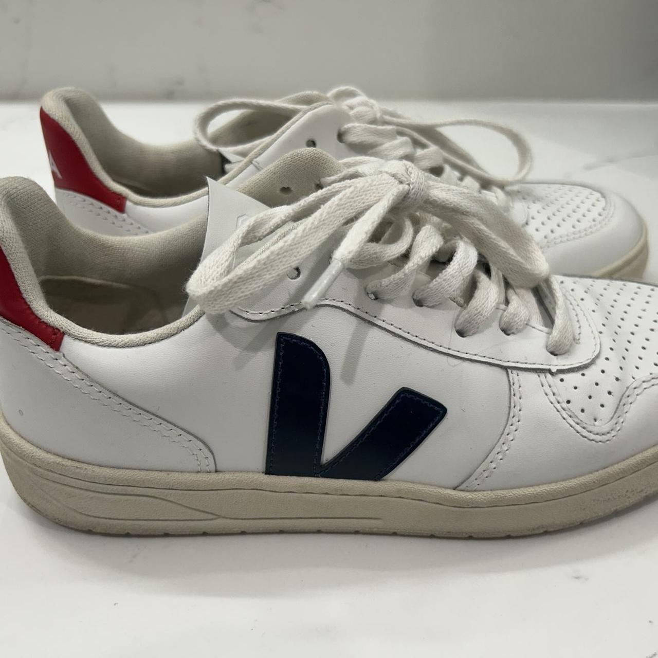 Veja, navy blue V, red heel, size 7 - Depop