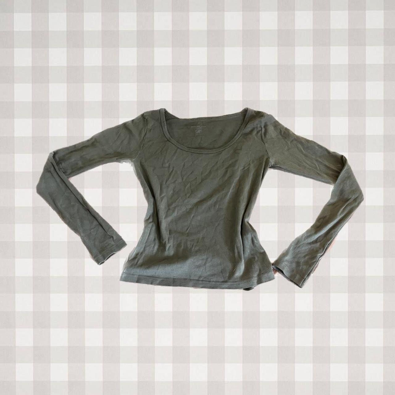 muted green brandy melville top. this shirt has a... Depop