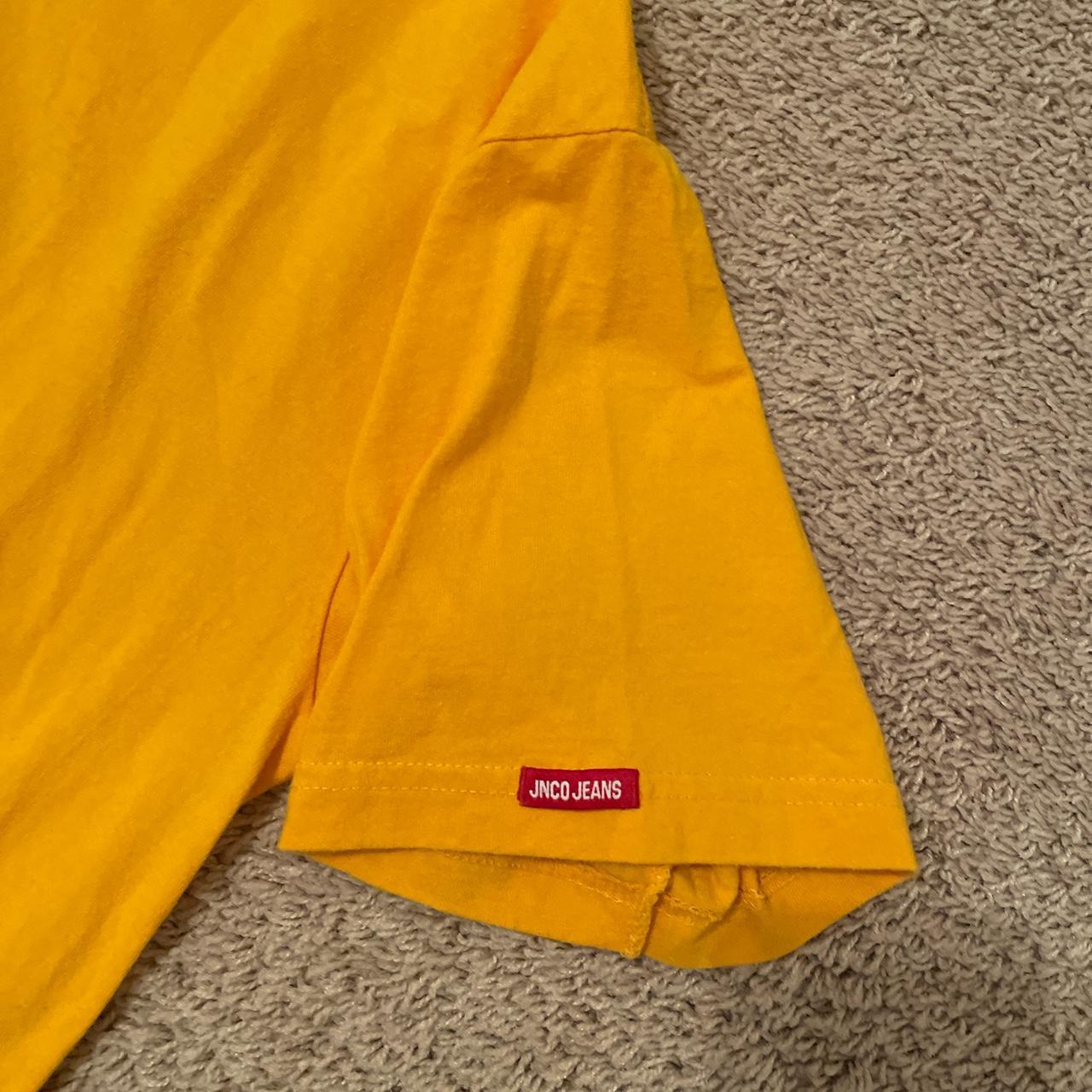 Yellow fire JNCO shirt -Size large -Small stain... - Depop
