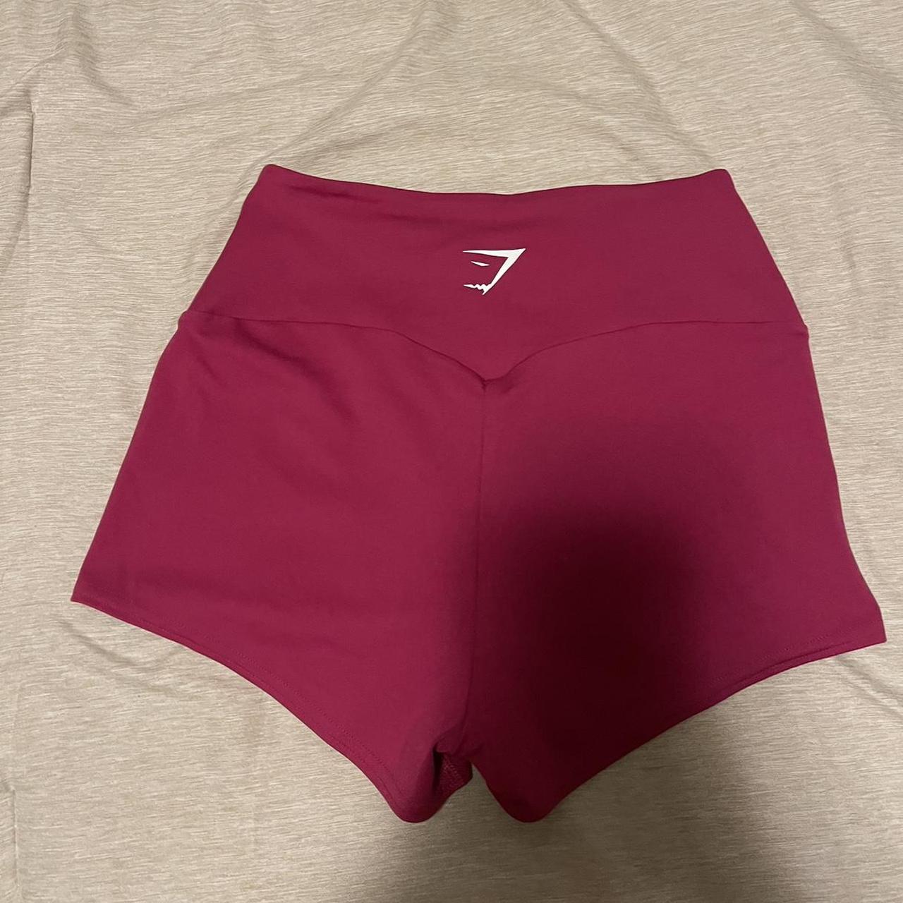 Pink gymshark running shorts in size medium cheeky Depop