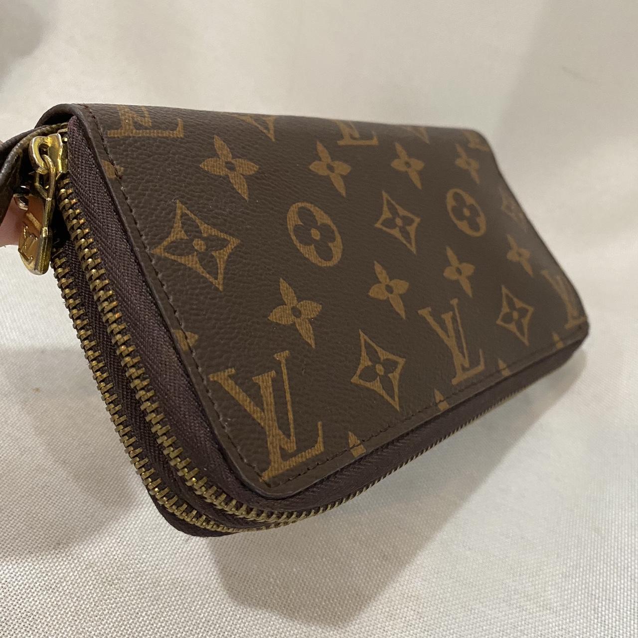 Louis Vuitton slim wallet/purse. This came with a - Depop