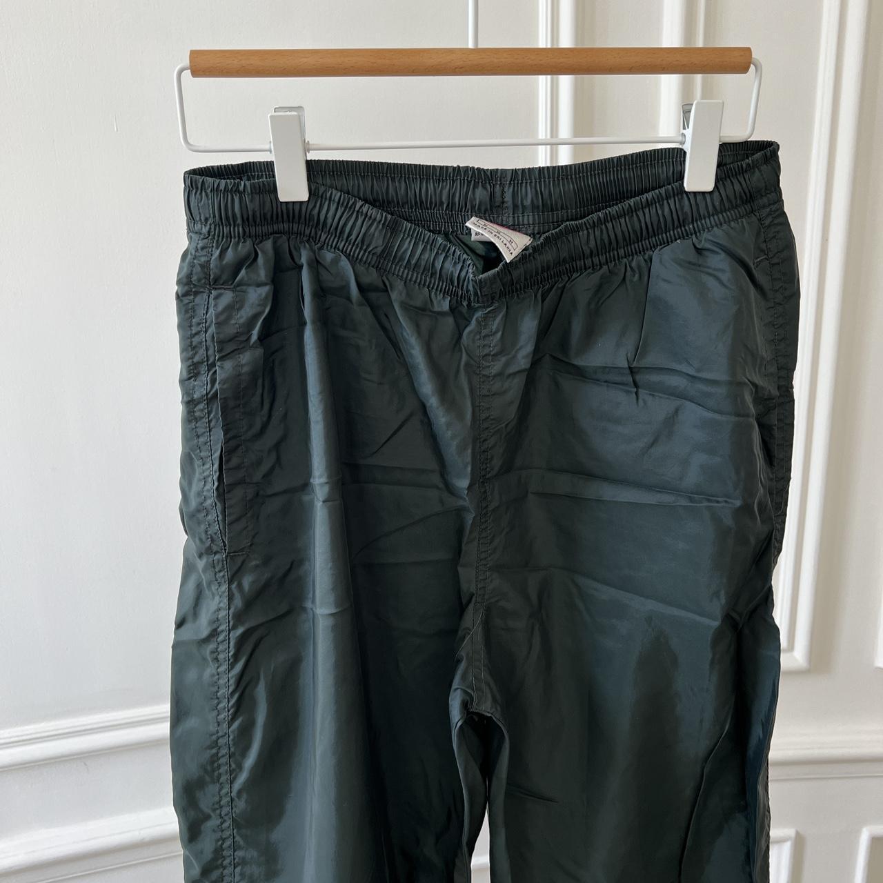 Vintage nike track pants in dark green size medium... Depop