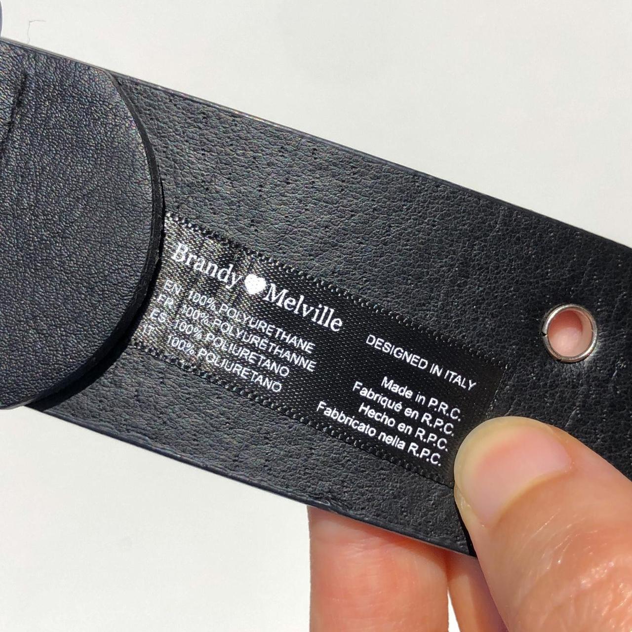 Brandy Melville black leather silver grommet belt... Depop