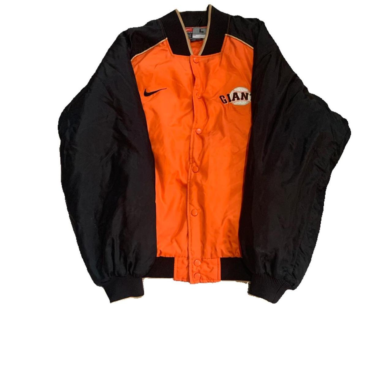 Orange and black nike jacket best sale