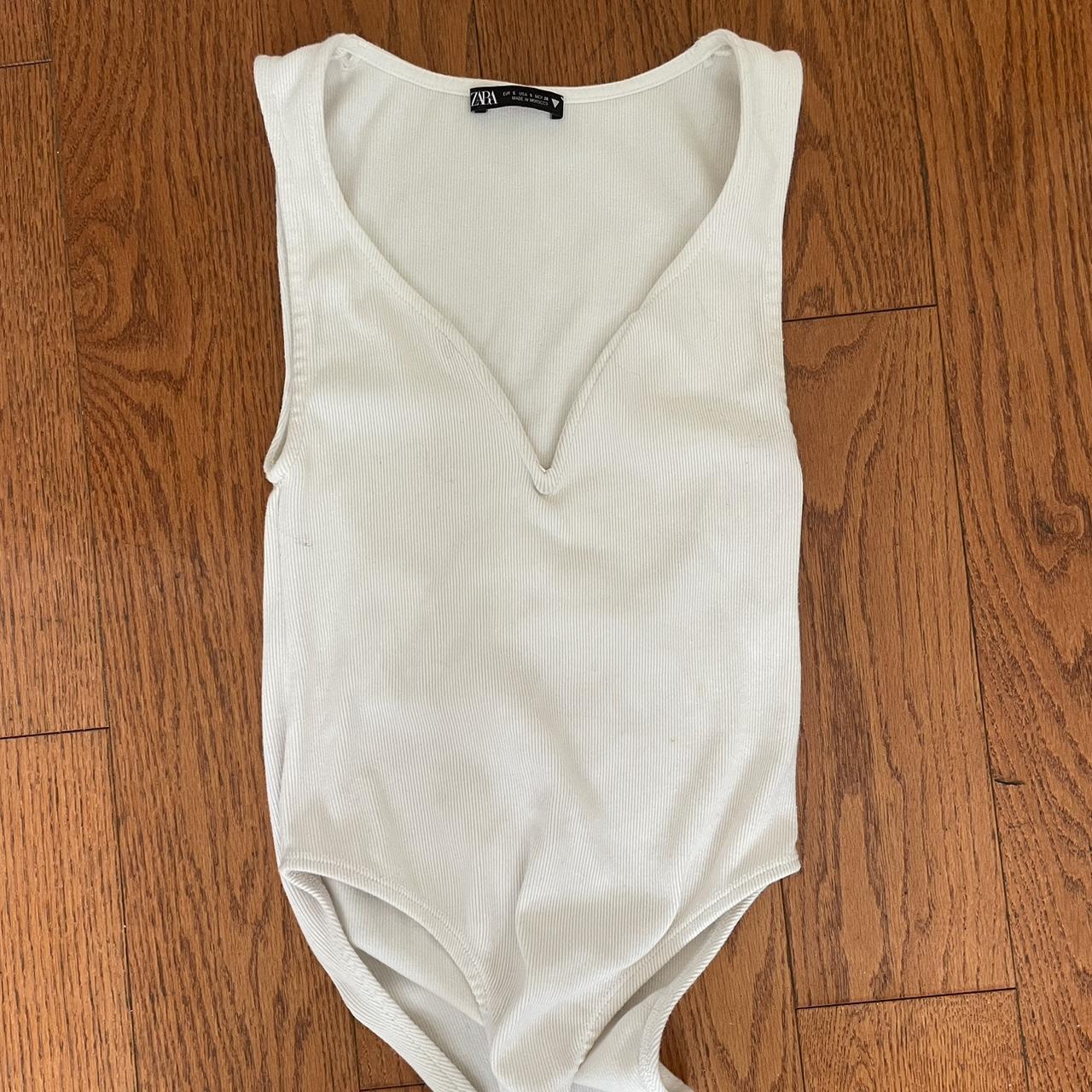 White ribbed Zara bodysuit. Could be bleached to be... Depop