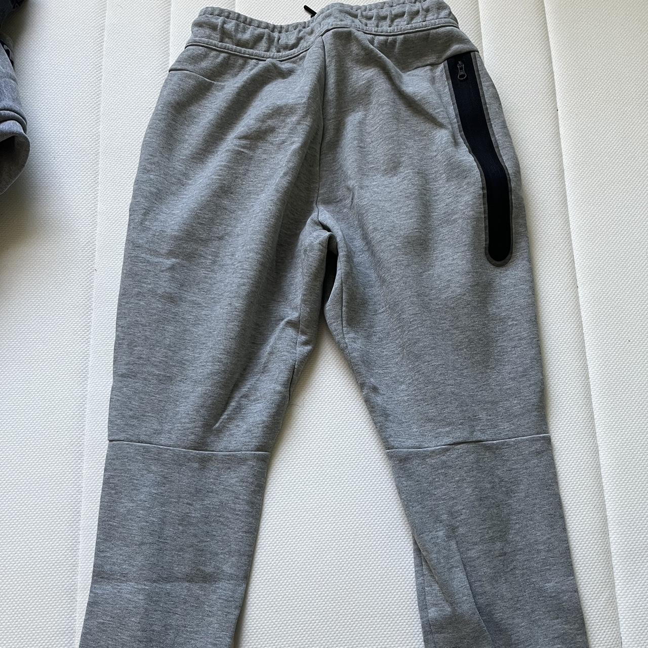 Grey Nike tech pants Kids size L Slightly worn, no... - Depop