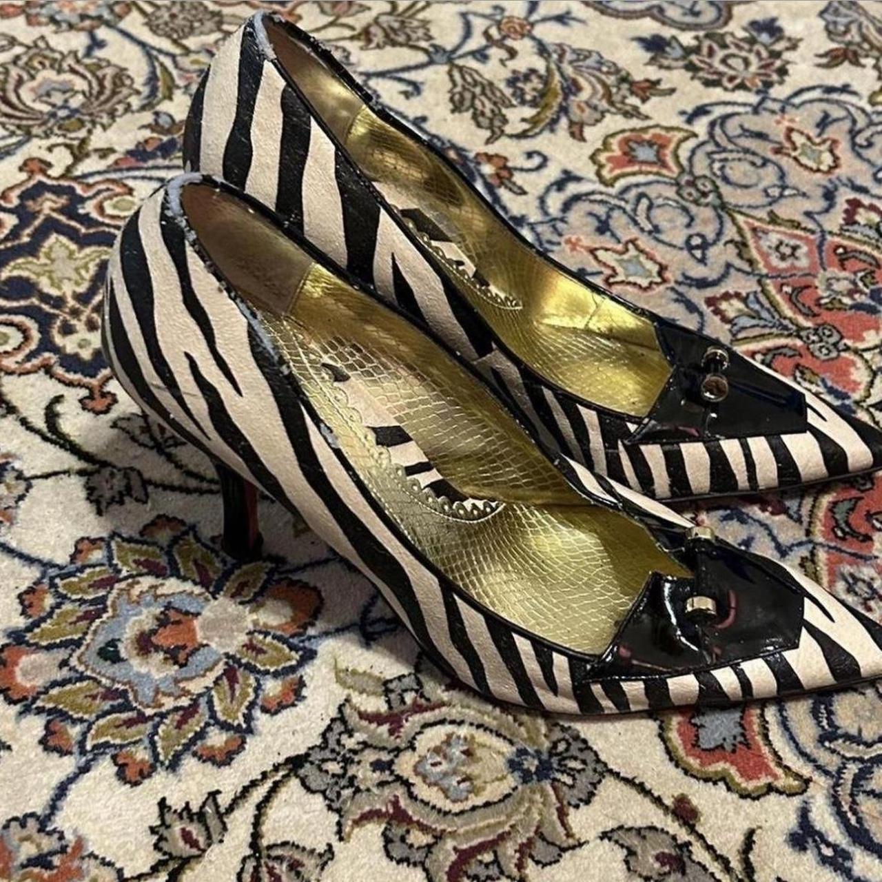 Zebra heels with 2025 red bottoms