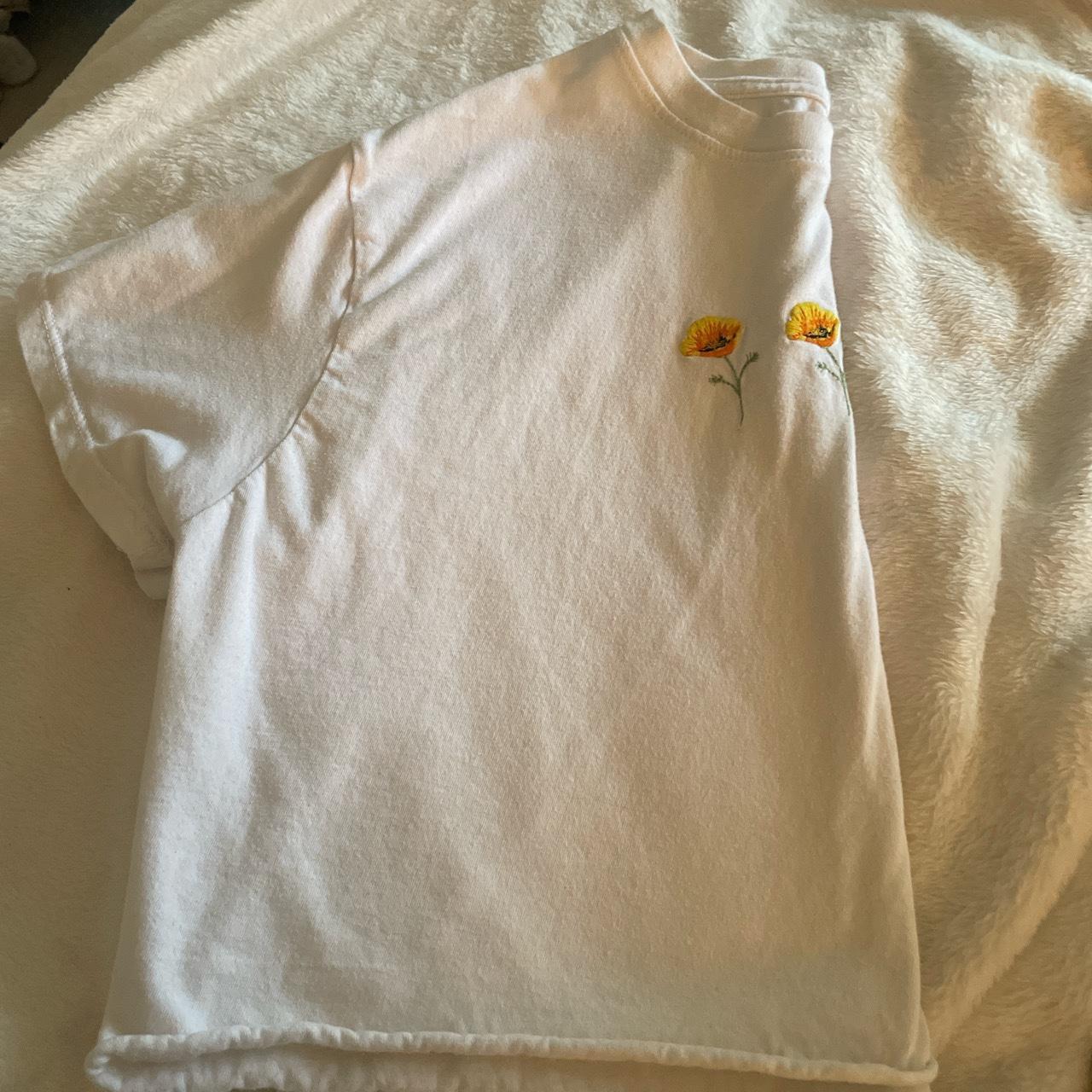 simple white top with flowers fits small+ medium... Depop