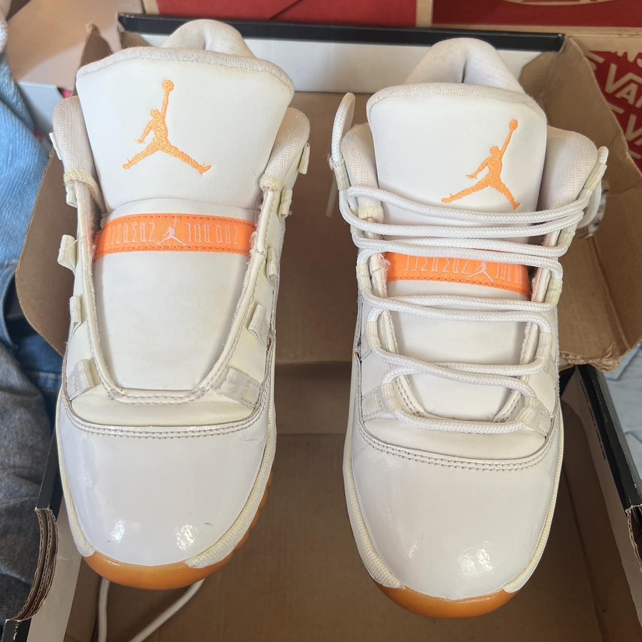 orange and white citrus jordans