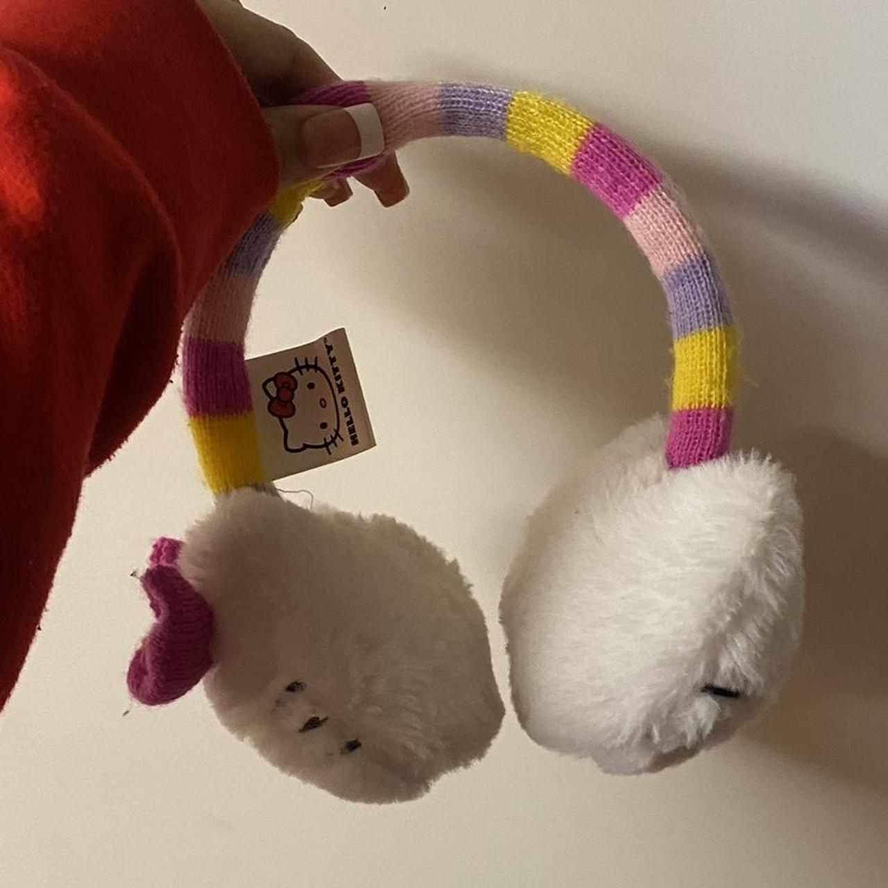 hello kitty earmuffs !!!! worn a couple of times,... Depop