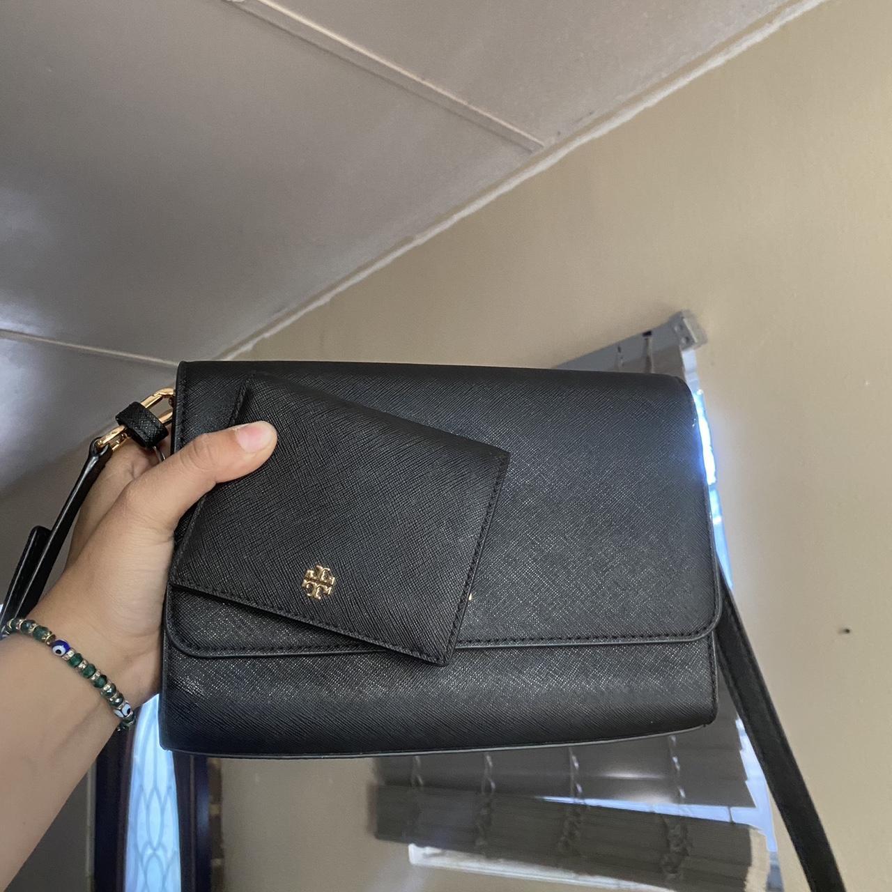 tory burch black and gold cross body ( barley used )... Depop
