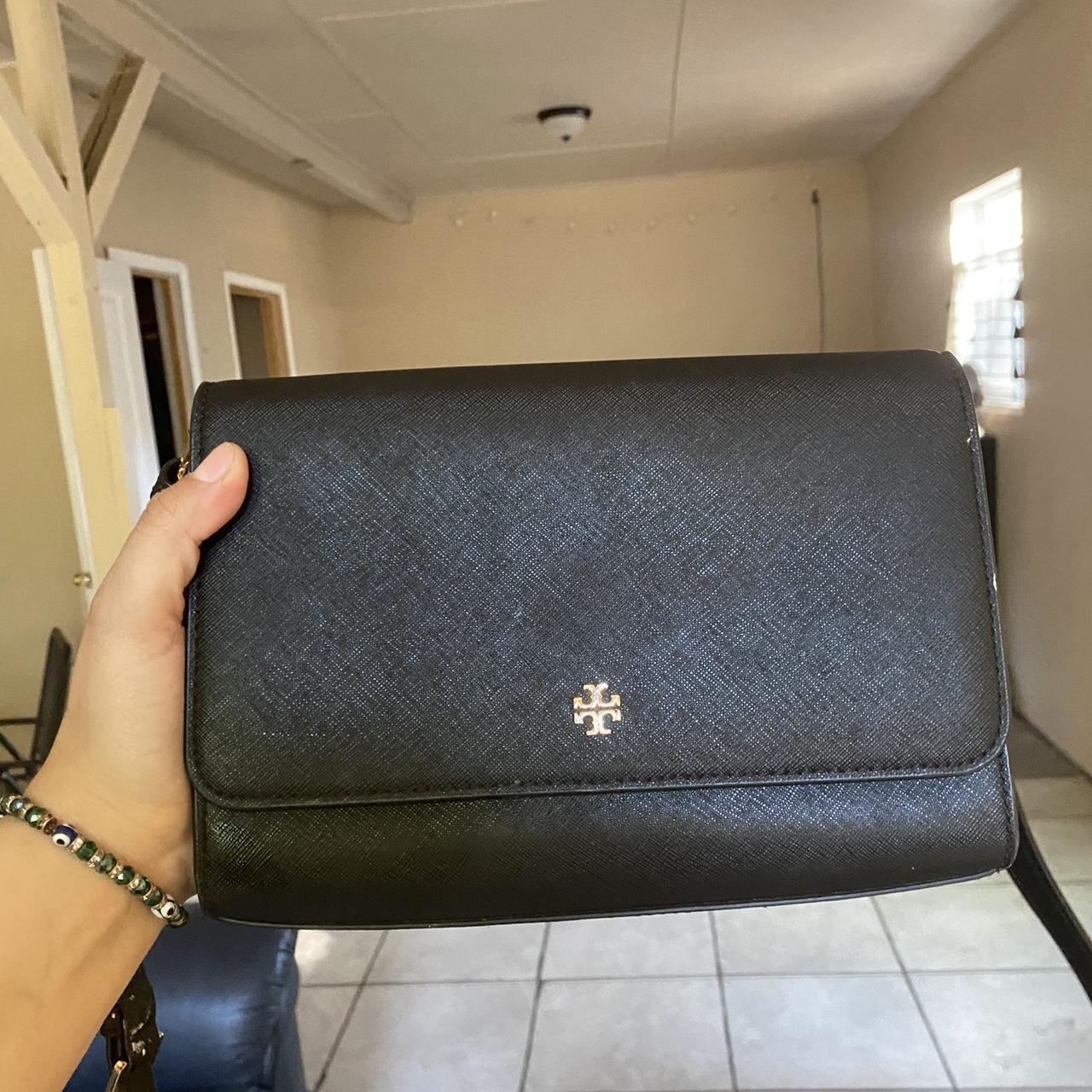 tory burch black and gold cross body ( barley used )... Depop