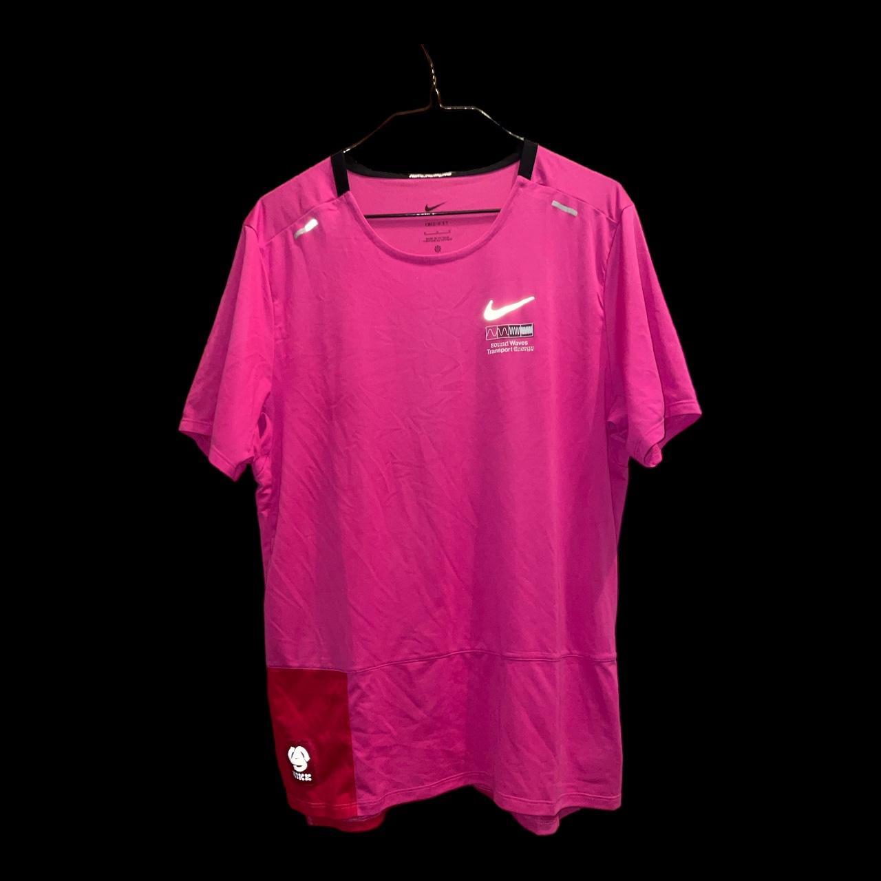 hot pink and black nike shirt