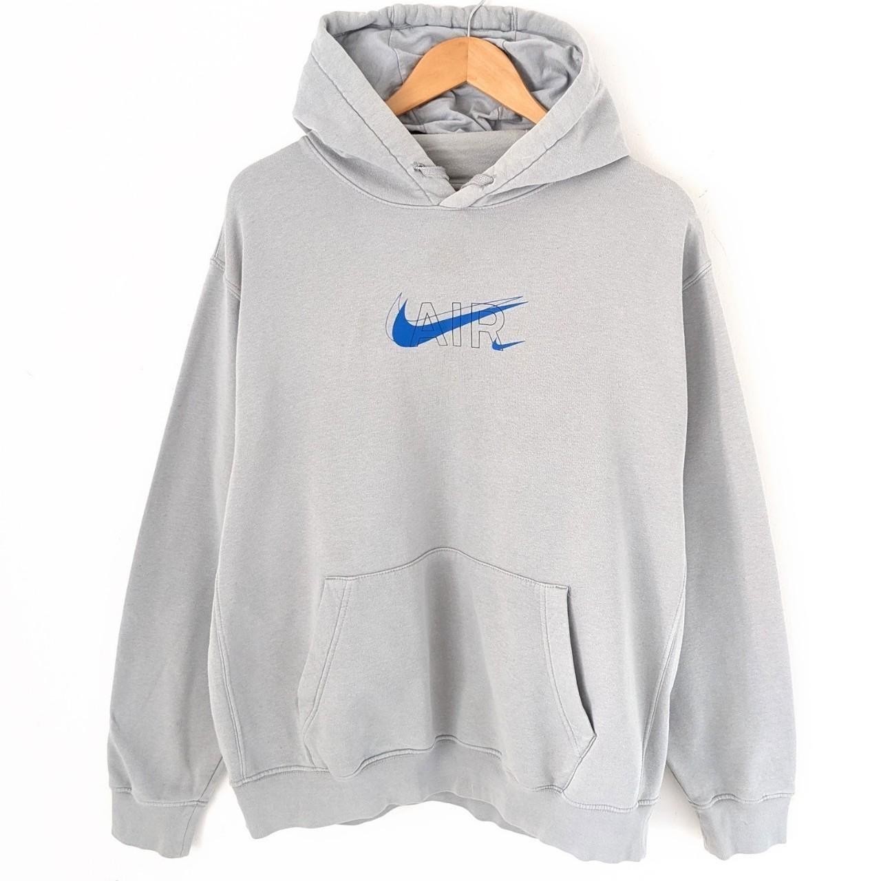 white nike jumper with black ticks all over