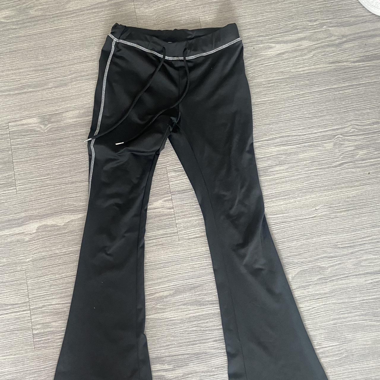 Black drawstring flares white stitching black... Depop