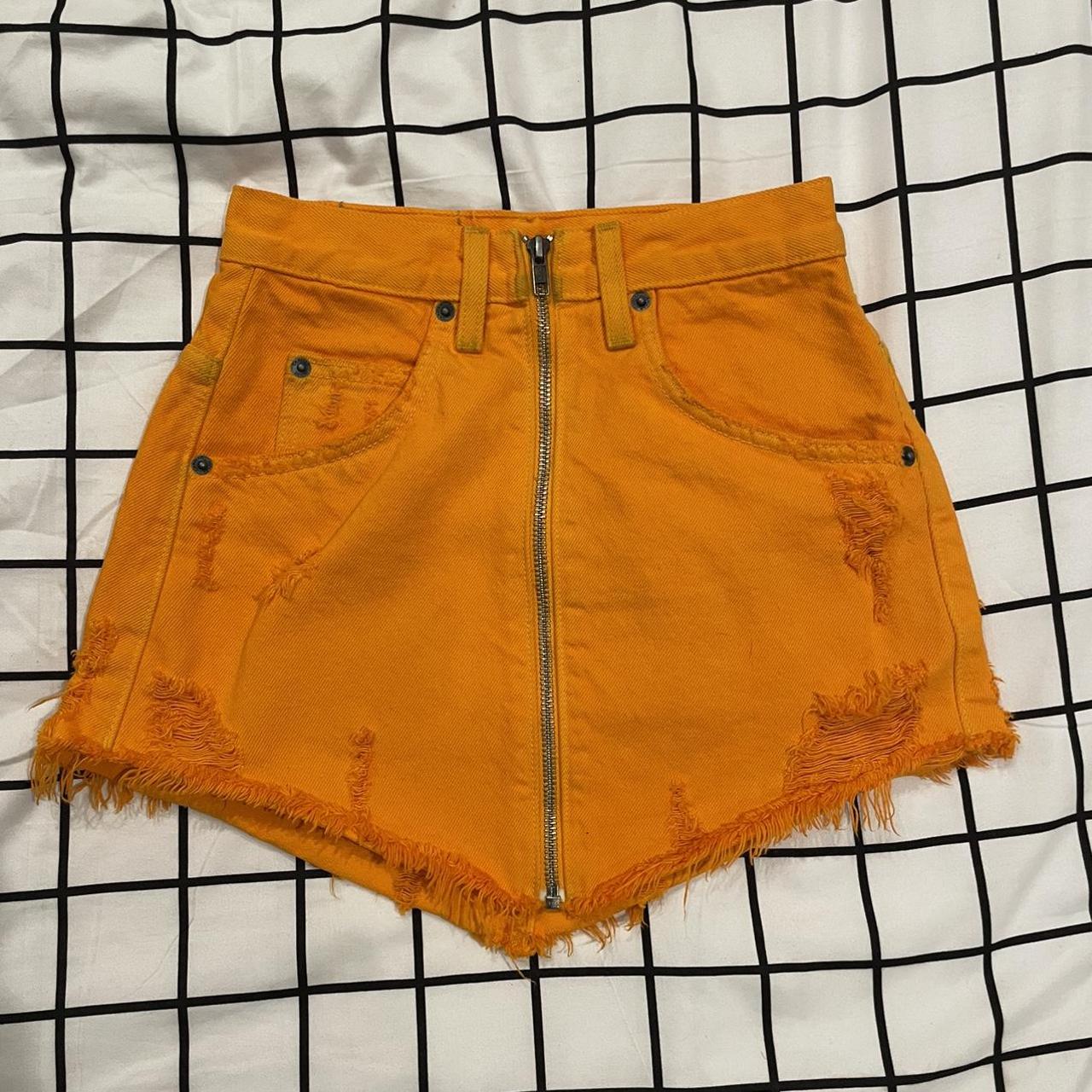 Neon orange jean skirt with V cut