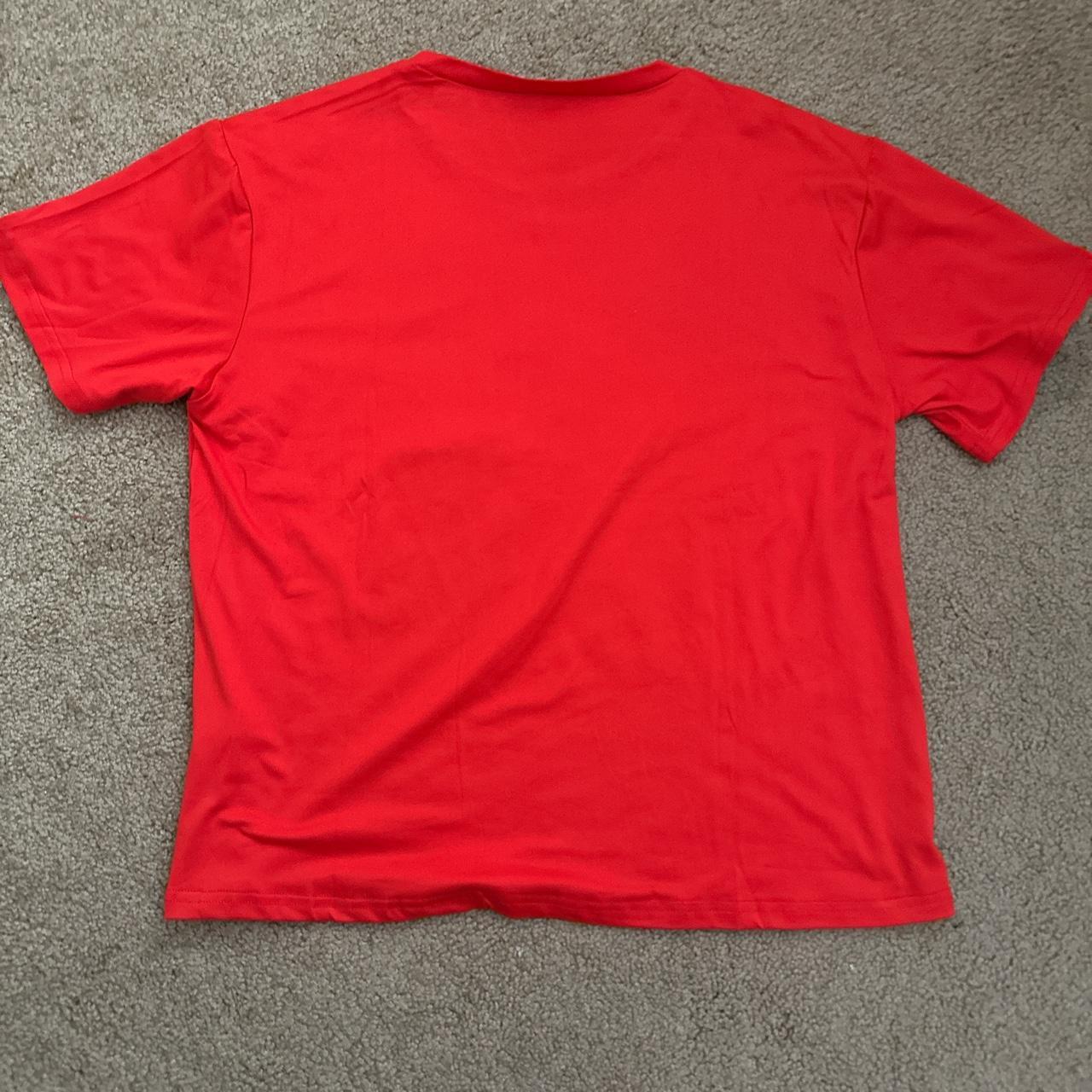 Red tee No clue what brand i got it at the thrift... - Depop