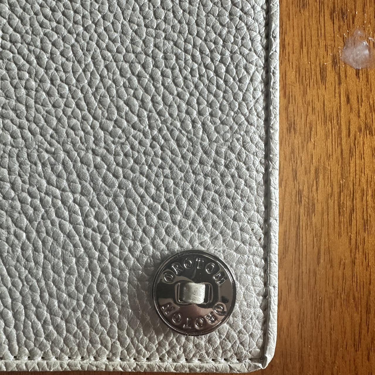 Oroton passport holder silver brand new never used... Depop