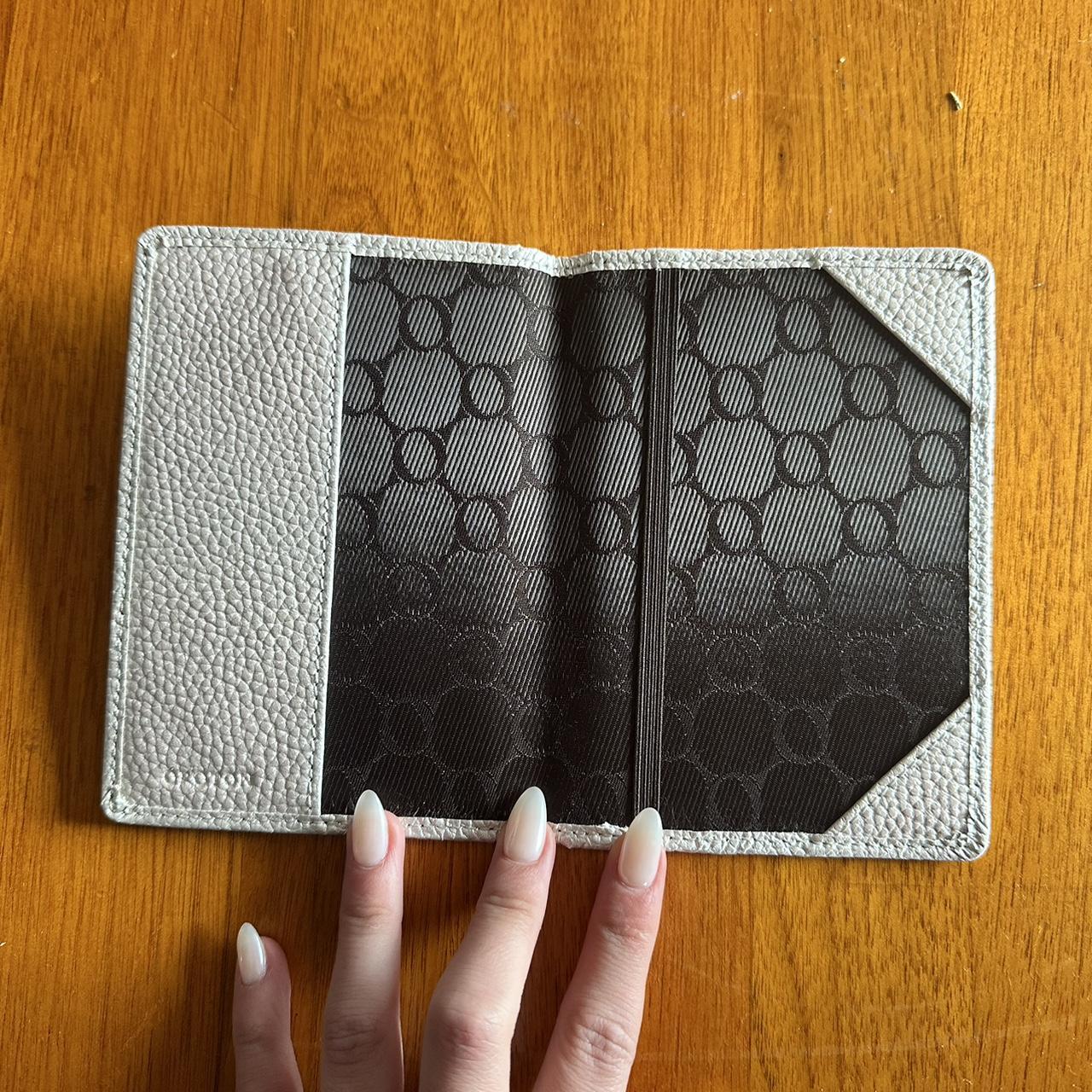 Oroton passport holder silver brand new never used... Depop