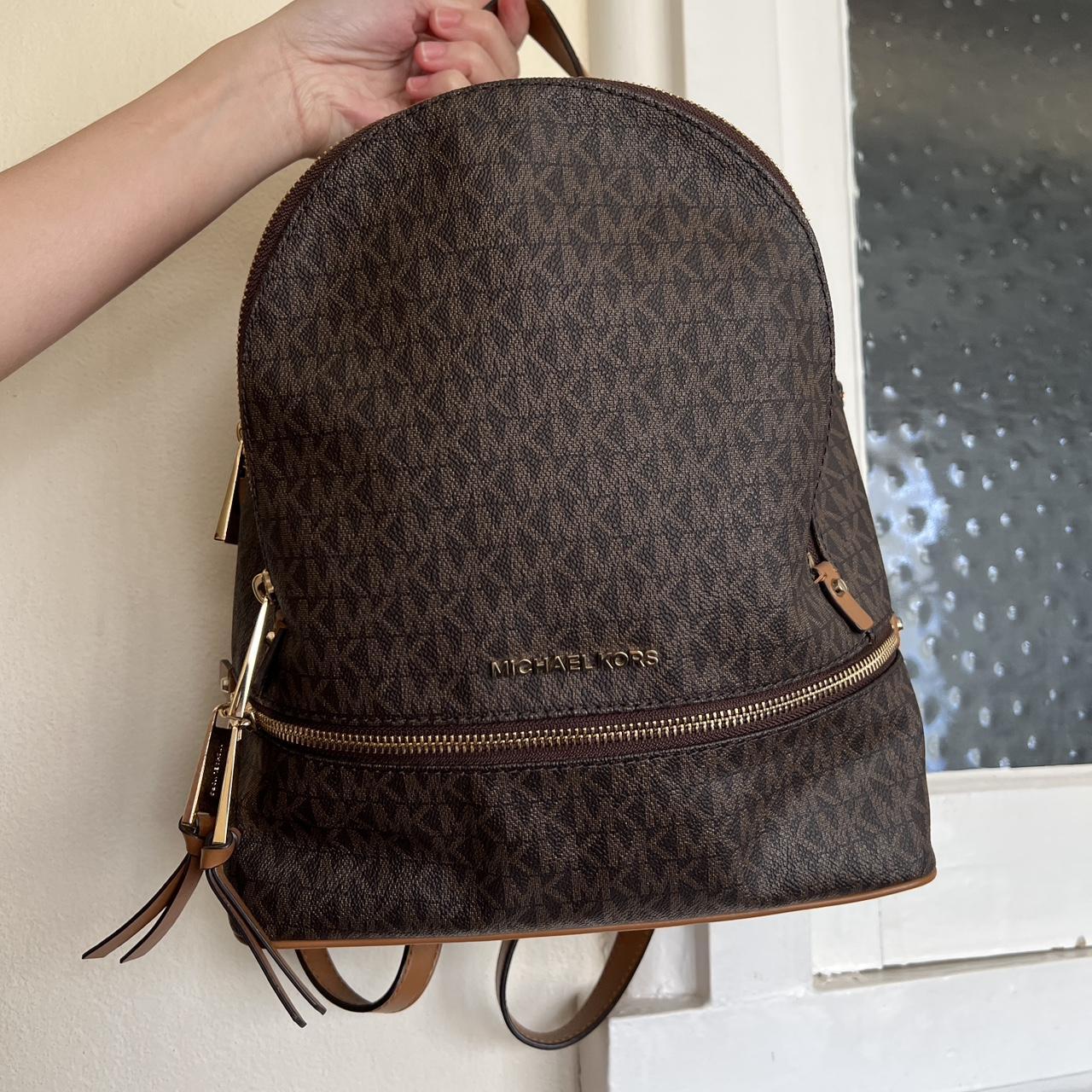 Michael kors 2025 monogram backpack