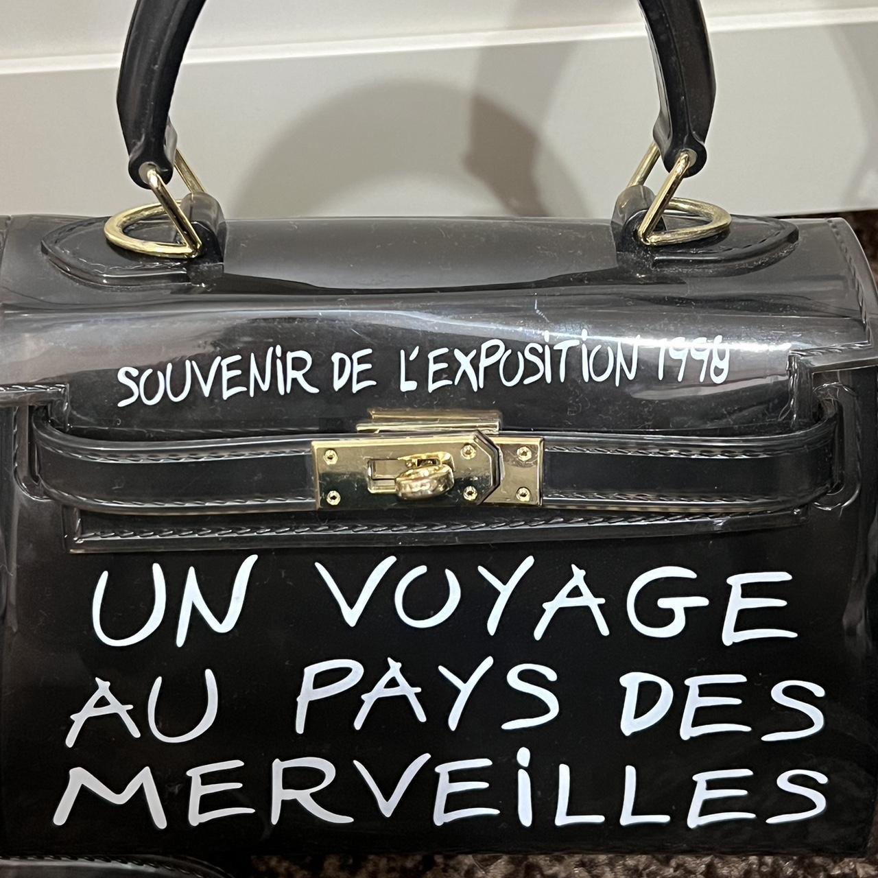 clear transparent bag with French writing Have. Depop