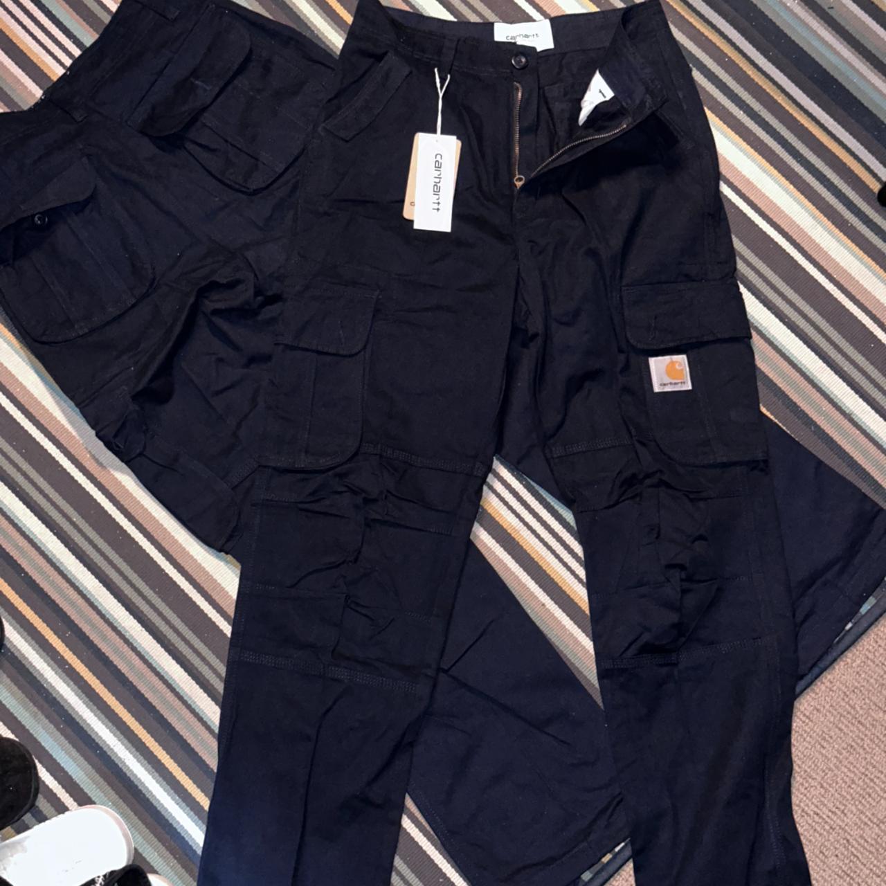 Carhartt Navy and Black Cargo Pants - $60 each x2... - Depop