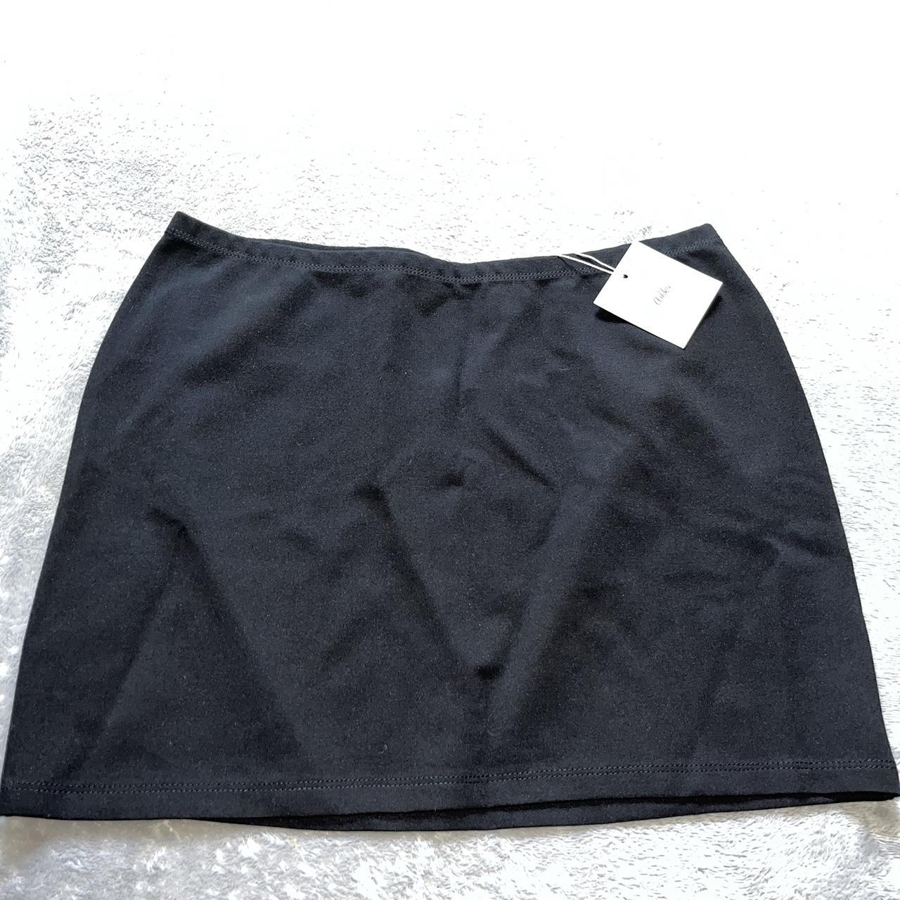 Brand new black mini skirt from adika (*store no... - Depop