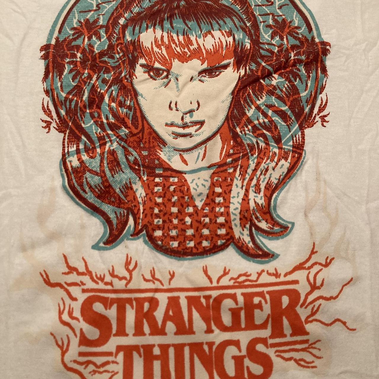 Stranger Things Eleven Light Changing Tee... - Depop