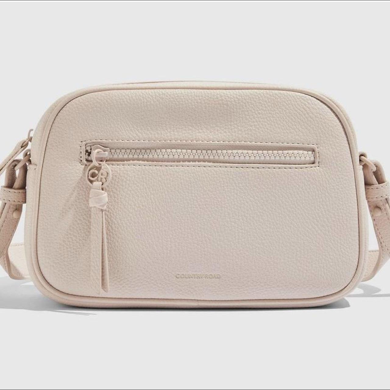 Country Road nude cross body bag has some signs of... - Depop