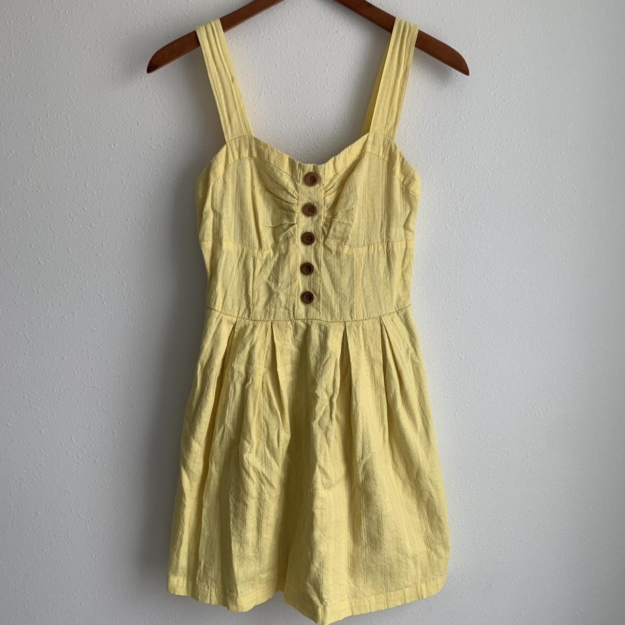 Charlotte Russe yellow sundress with brown button