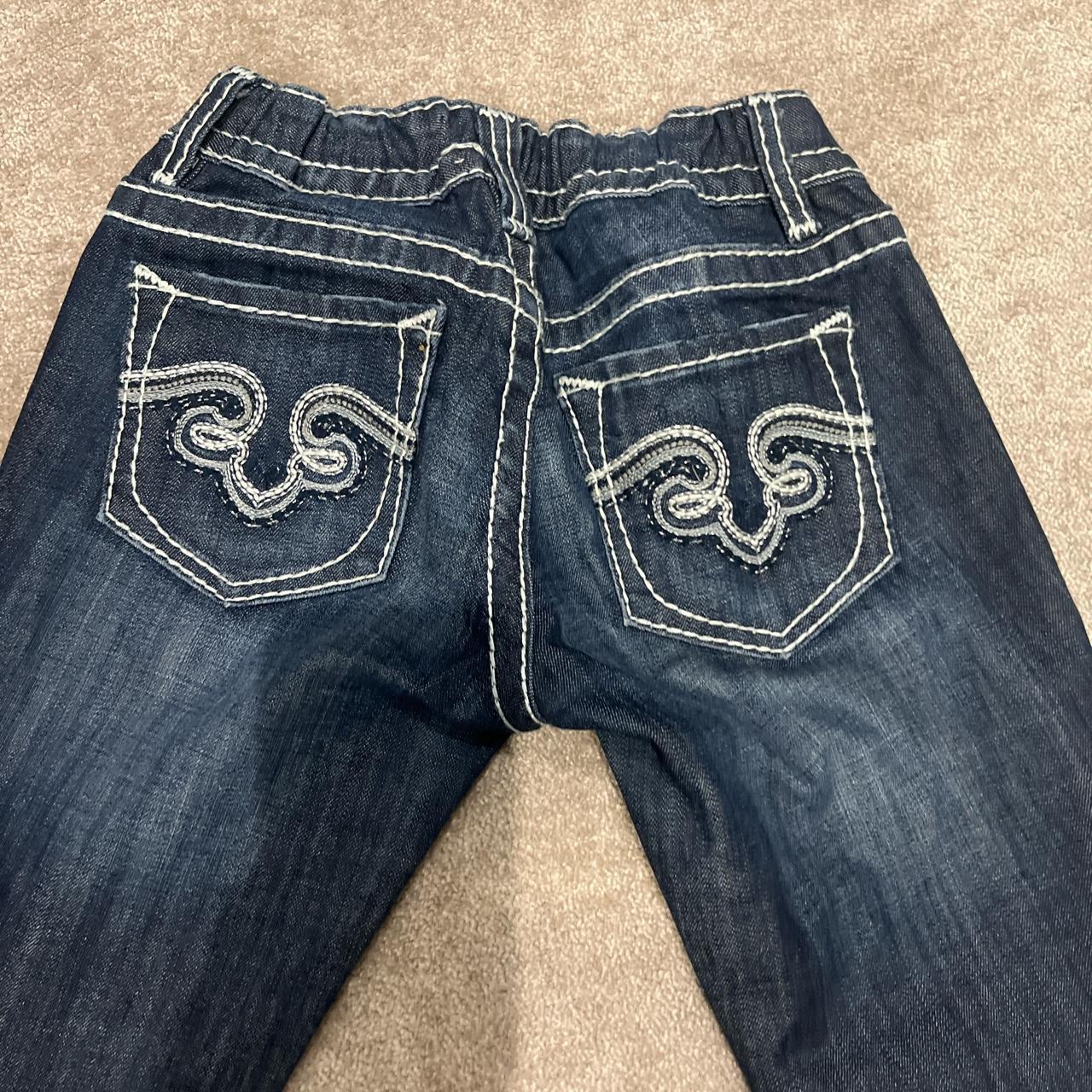 white stitch low rise bootcut jeans will fit waist... Depop