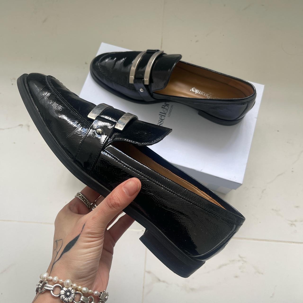 RUSSELL & BROMLEY chrome black leather flat trim... - Depop