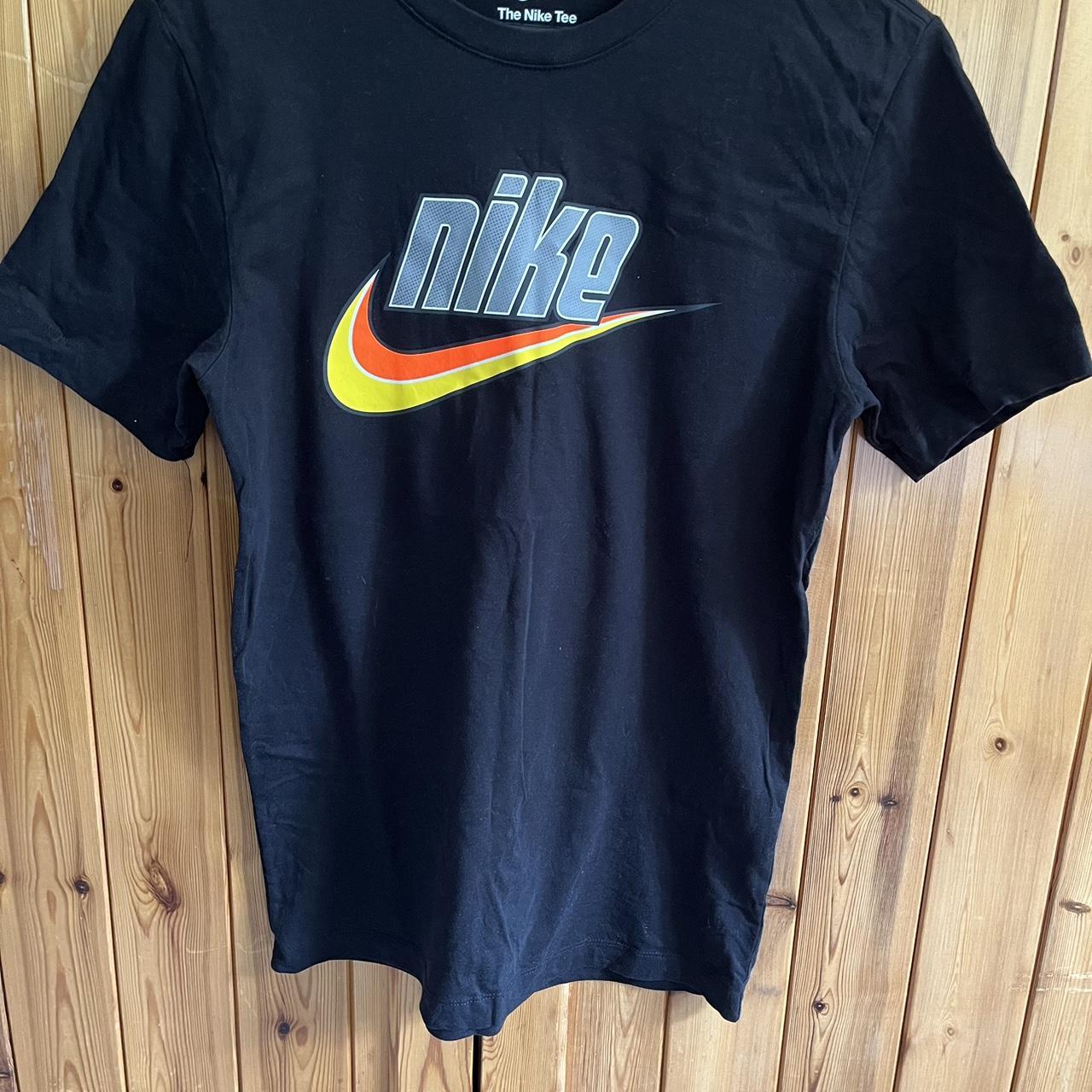 black nike shirt with orange