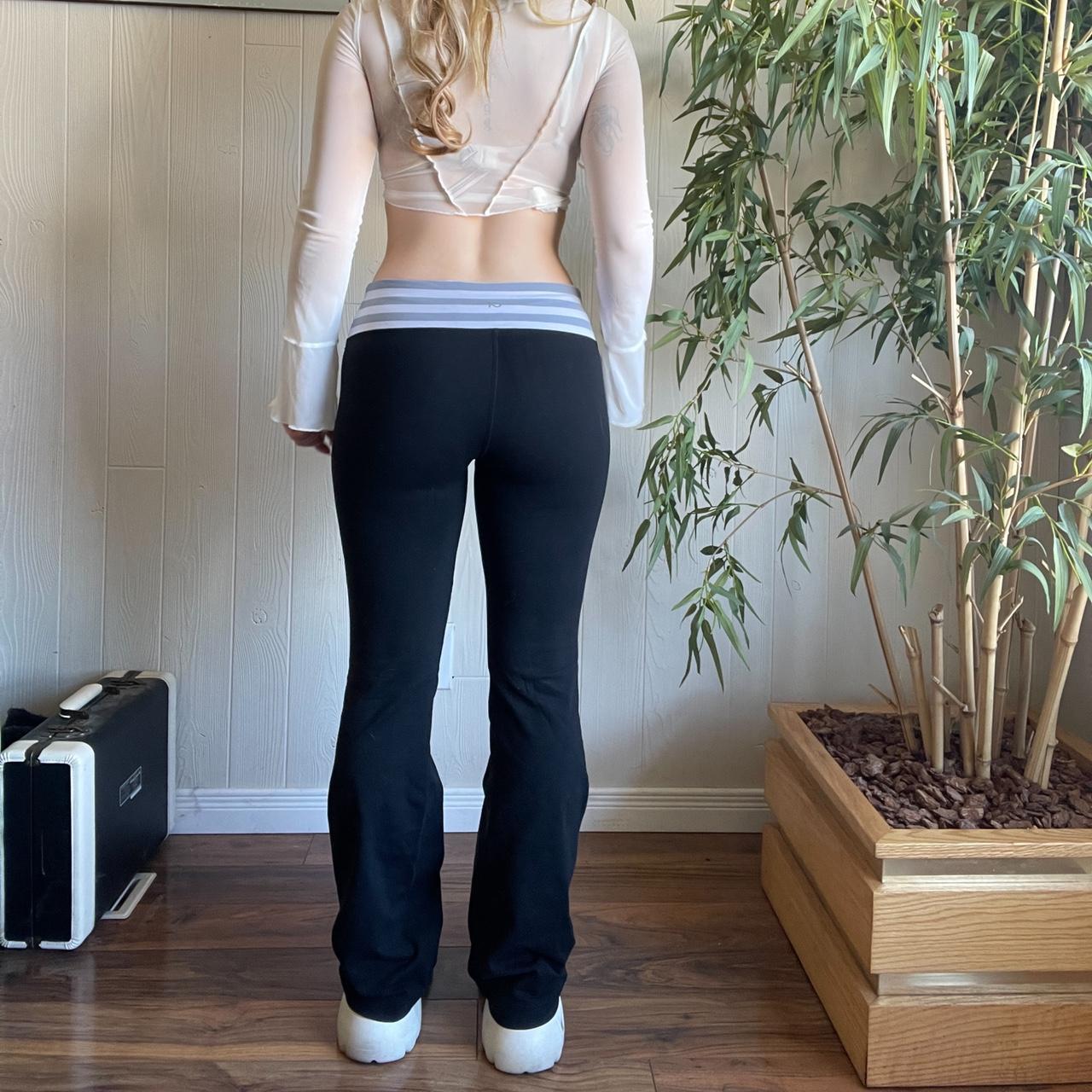 Black sporty y2k gap yoga flairs 🖤 with a grey and... Depop